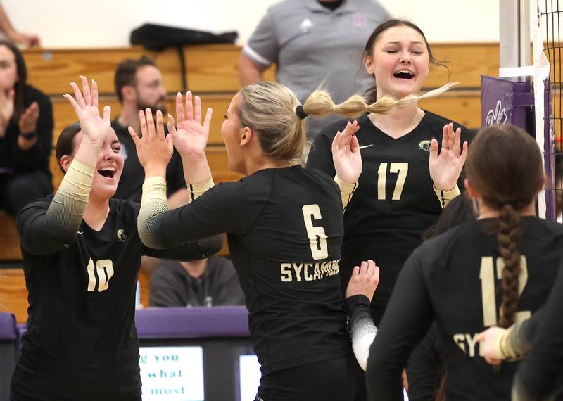 Sycamore players celebrate their Class 3A regional championship win over Dixon Thursday, Oct. 30, 2025, in Rochelle.