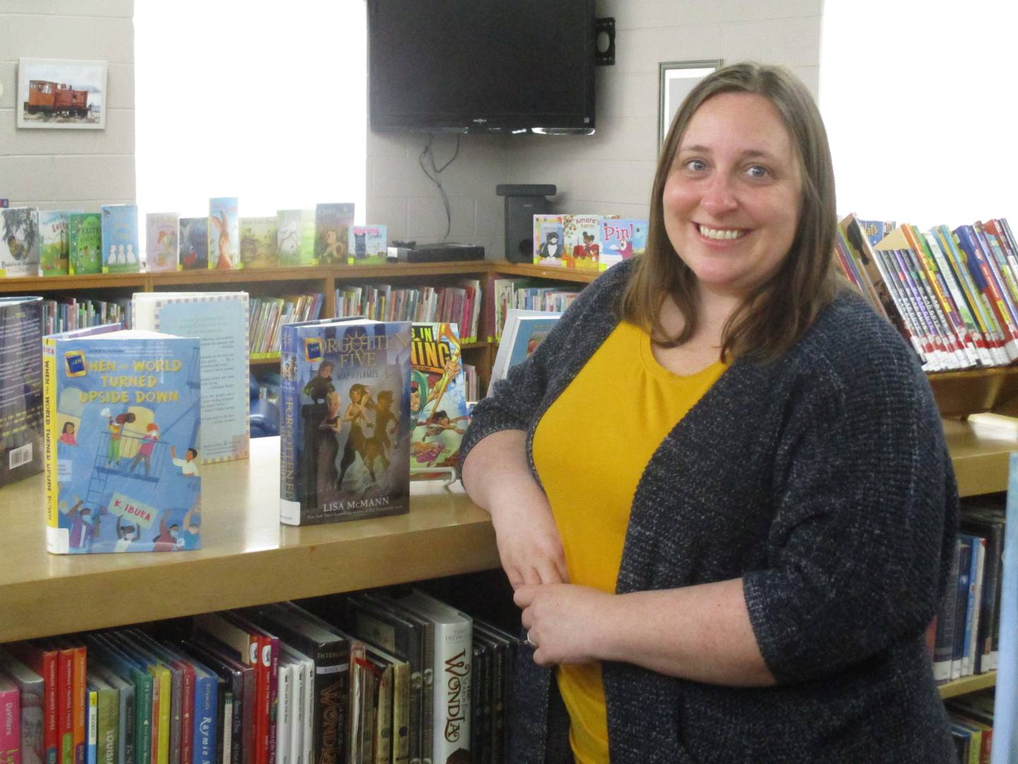 Fawnia Stanford, shown her in the youth services room of Newark's Charles B. Phillips Public Library in Newark, is in charge of children's programming. (Mark Foster -- mfoster@shawmedia.com)