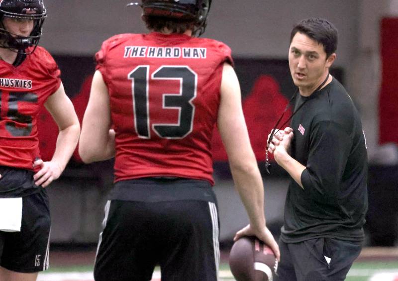 New Northern Illinois offensive coordinator Quinn Sanders talks to his quarterbacks during the first spring football practice Thursday, March 27, 2025, in the Chessick Practice Center at NIU in DeKalb.