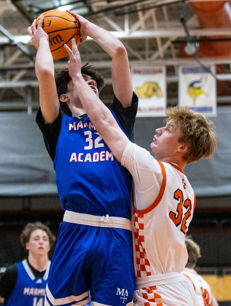 Marmion Academy forward Samuel Dalmann goes up for a layup during a game against St. Charles East High School on Saturday, Jan. 4, 2025.