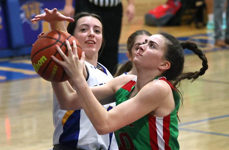 Somonauk's Brynn Pennington blocks the shot of LaSalle-Peru's Bailey Pode during their game Thursday, Nov. 16, 2023, in the Tim Humes Breakout girls basketball tournament at Somonauk High School.