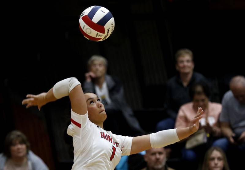 Huntley's Sophia Tocmo serves the ball during an IHSA Class 4A McHenry Sectional volleyball match against Mundelein on Tuesday, Nov. 5, 2024, at McHenry High School Freshman Campus.