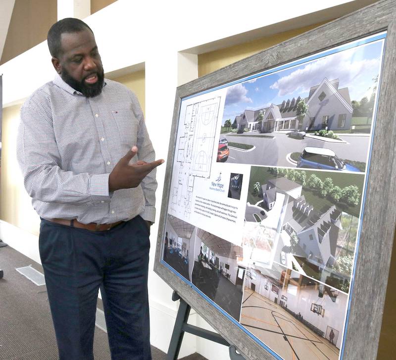 New Hope Missionary Baptist Church Pastor Joe Mitchell talks Friday, Feb. 24, 2023, at the church in DeKalb, about the plans for a community center addition at the church.