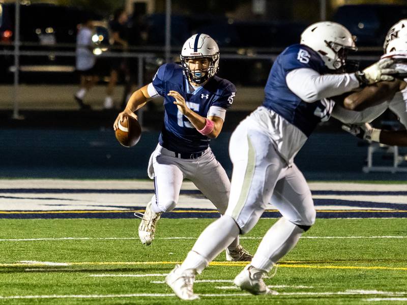 Plainfield South's Cody Hogan runs against Plainfield North on Sept. 13, 2024.