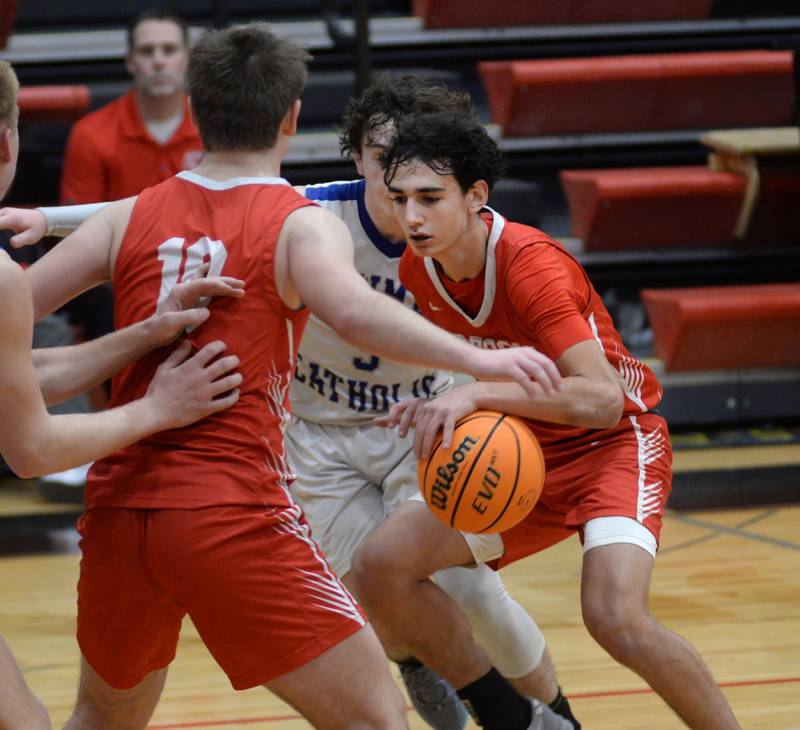 Oregon's Benito Olalde (5) drives to the basket against Sterling Newman on Wednesday, Dec. 18, 2024 at the 63rd Annual Forreston Holiday Tournament.