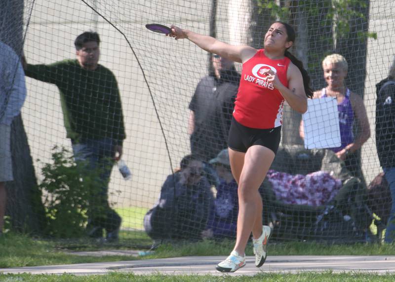 Ottawa's Sam Ruiz throws discus during the Interstate 8 Conference girls track championship on Friday, May 9, 2025 at Morris High School.