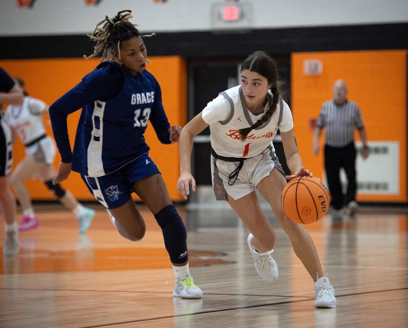 Beecher's Madison Smith, right, controls the ball as Grace Christian's Zoey Baldridge, left, guards in a game on Monday, January 5, 2026.