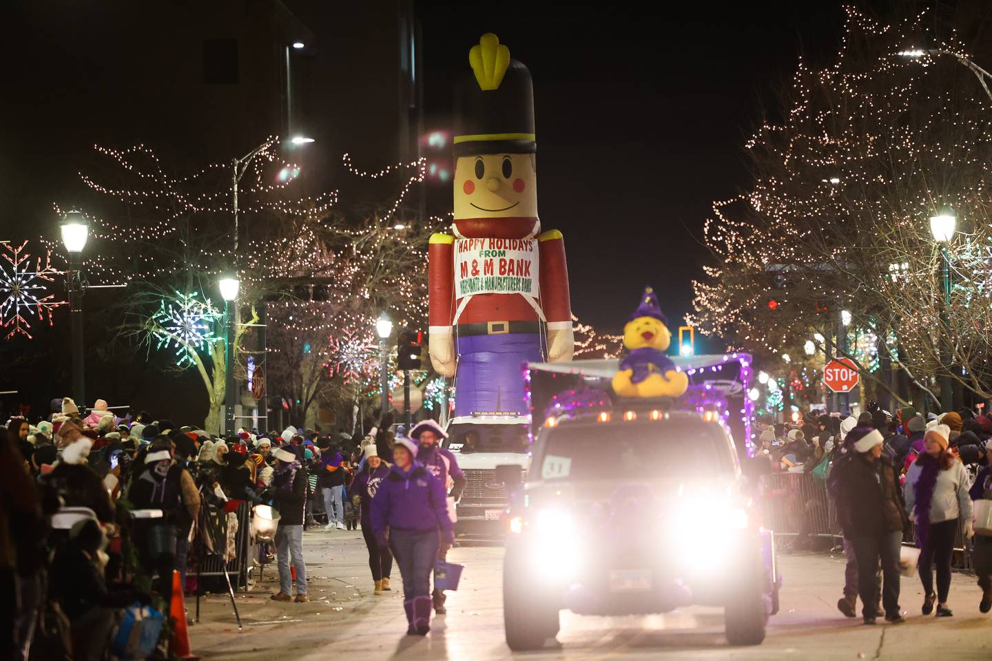 A giant nutcracker rides down Chicago Street at the Joliet Light up the Holidays Parade in downtown Joliet on Friday, Nov. 24, 2023.