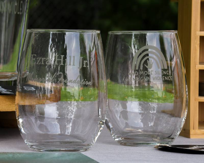 Etched glass and other items were for sale on Saturday, June 7, 2025, to support the Ezra Hill Jr. Memorial Foundation’s 5th annual rock painting event held at Tyler Elementary School in DeKalb. The foundation was created to memorialize the late DeKalb boy, shot and killed in 2019.