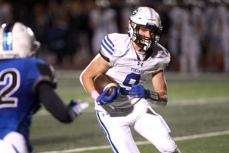 Geneva’s Michael Loberg runs the ball during a game against St. Charles North in St. Charles on Friday, Oct. 20, 2023.