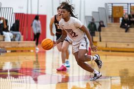 Braydon Porter rocks the rim, Yorkville slams past Minooka