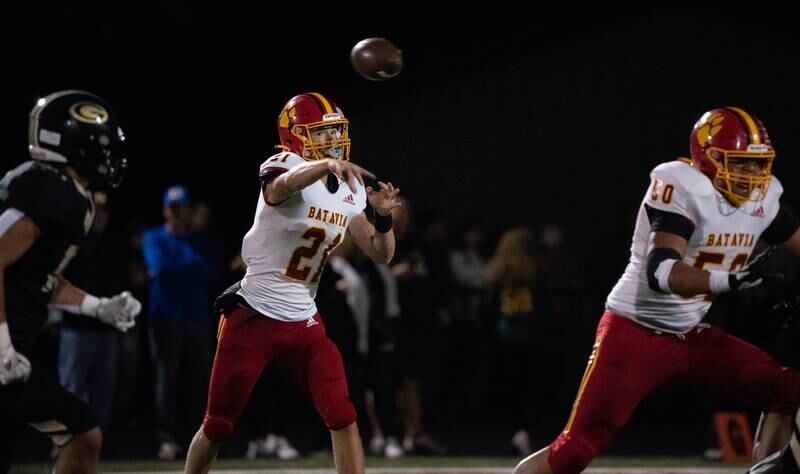 Batavia’s Ryan Boe (21) passes the ball against Glenbard North during a football game at Glenbard North High School in Carol Stream on Friday, Sep 23, 2022.