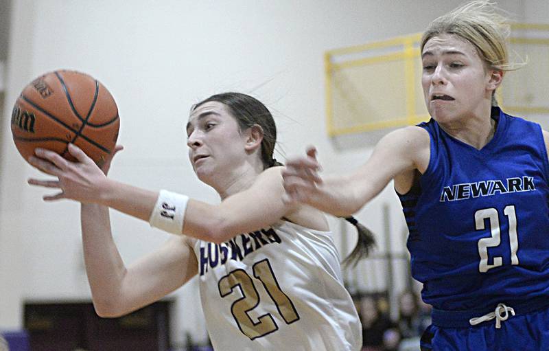 Serena’s Makayla McNally and Newark’s Addison Ness battle for a loose ball in the 1st period during the Class 1A Sectional final on Thursday, Feb. 23, 2023 in Serena.