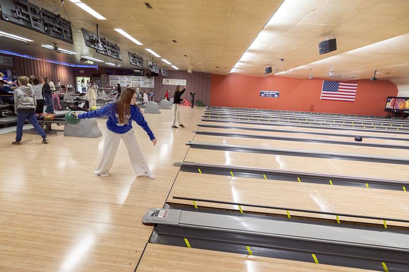Ellie Mason, seventh grader at St. Mary’s School in Sterling, loads up for a throw Tuesday, Jan. 28, 2025, at Blackhawk Lanes.