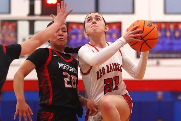 Photos: Huntley vs. Mundelein at Dundee-Crown in Komaromy Classic girls basketball