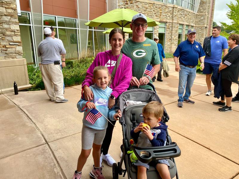 (Back left) Brianna Wicker, husband and U.S. Navy veteran John Wicker, pose with their children, Sailor Wicker, 7 (bottom left), and Linken Wicker, 2. The Sycamore family walked together in the inaugural Be the One Walk, a 2.2-mile trek hosted by the DeKalb American Legion Post No. 66 and Legion Auxiliary to combat veteran suicide rates. The event was held at Northwestern Medicine Health and Wellness Center in DeKalb on Sunday, Sept. 22, 2024.