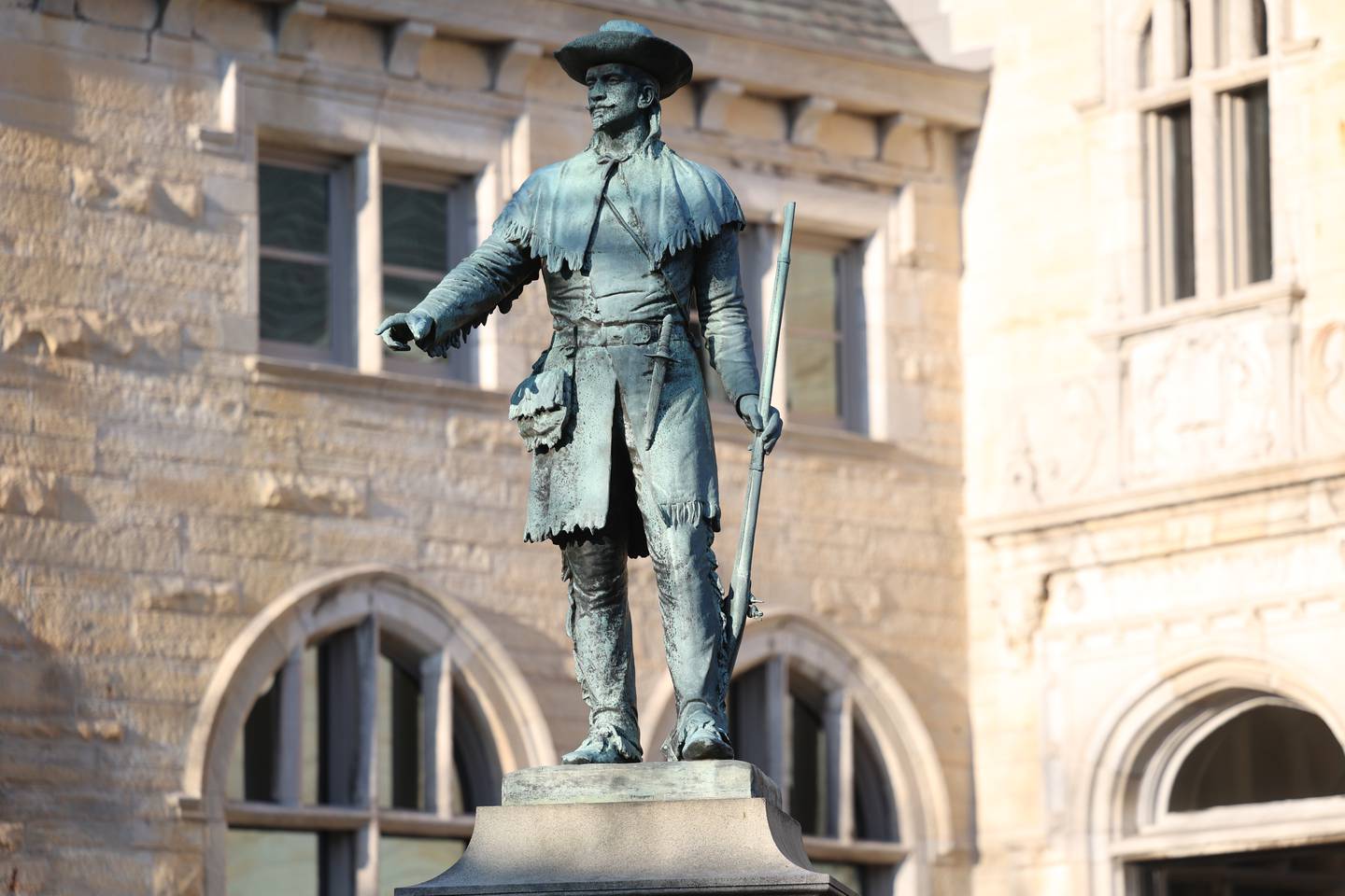A statue of famed 17th century French-Canadian explorer Louis Joliet stands outside the Downtown Joliet Library.