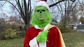 Pair of Grinches bring holiday joy