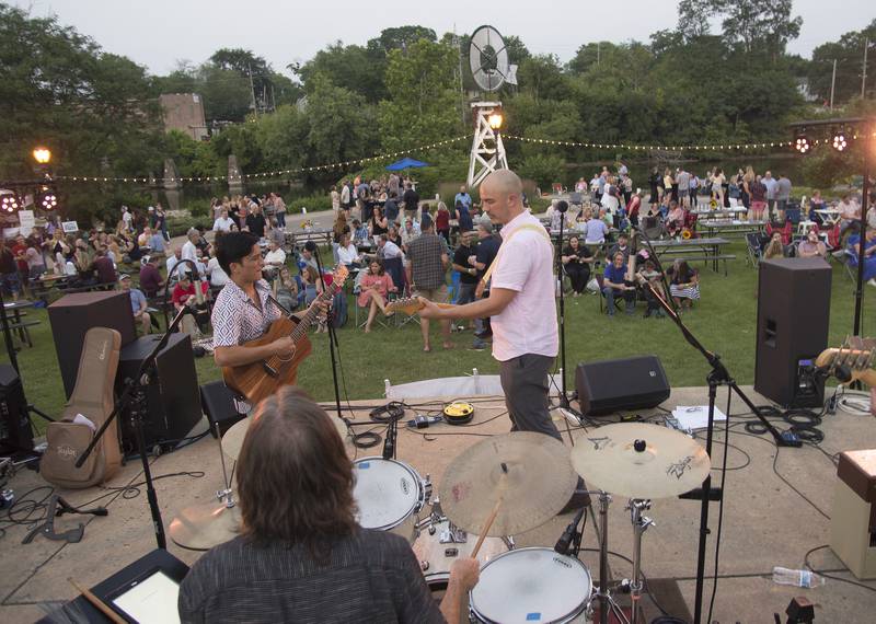 The Cocktails, Paulo Apuli, left, Brad Schlueter, center, and Brent Hansen entertain patrons at Cocktails in the Park fundraiser benefitting Batavia Main Street Saturday, July 31 in  Appleton Park.