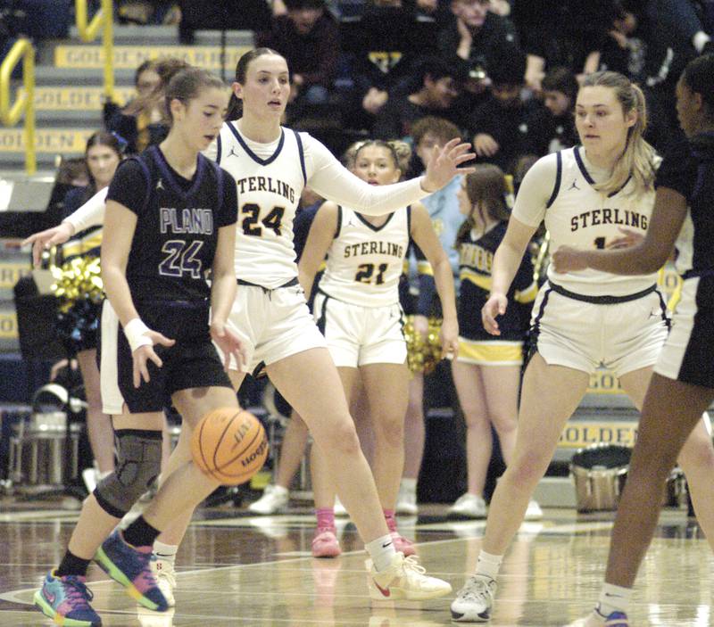 Plano's Chole Howe is guarded by Sterling's Madison Austin.The Sterling Golden Warriors faced off against Plano Lady Reapers in an IHSA 3A Regional girls final at Musgrove Fieldhouse in Sterling on February 20, 2025. Sterling won the game 70-38.