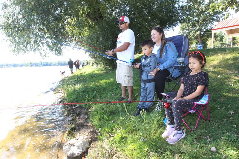 Wilfrido and Emily Valle, of Volo enjoy fishing with their children, Wilfrido, 5, and Onelia, 7, on the shore of Round Lake during the Family Fishing Event at Lake Front Park on Saturday, September 9th in Round Lake Beach. The event was sponsored by the Round Lake Area Park District and the Huebner Fishery Management Foundation.
Photo by Candace H. Johnson for Shaw Local News Network