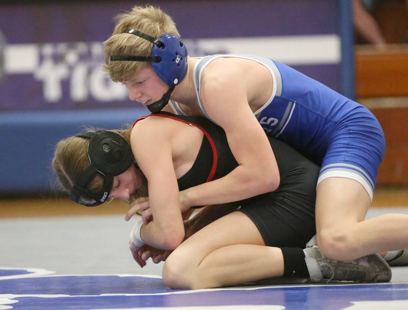 Princeton's Augustus Swanson wrestles L-P's Kiely Domyancich on Thursday, Jan. 19, 2023 at Princeton High School.