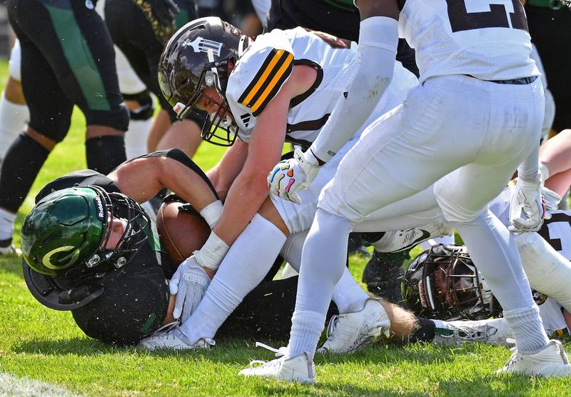 Glenbard West’s Max Hetlet scores a touchdown during a game against Glenbard West on September 6, 2025 at Glenbard West High School in Glen Ellyn.