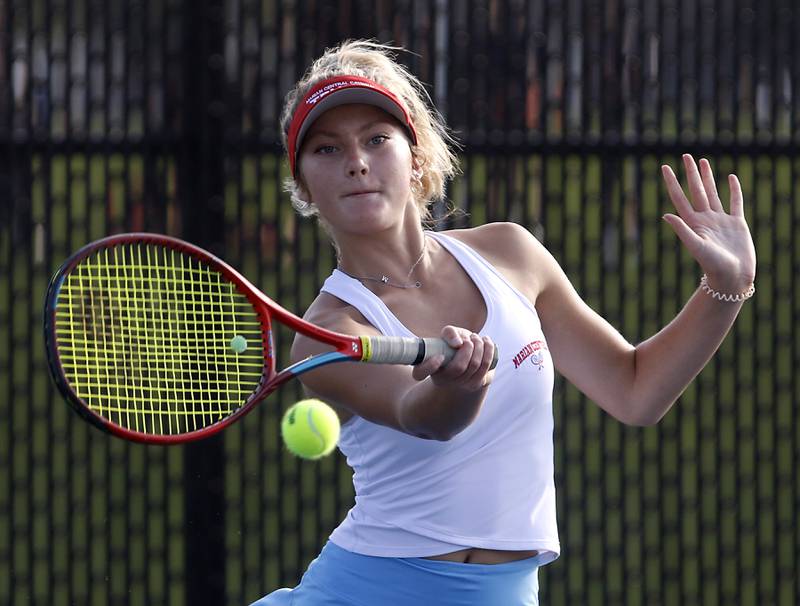 Marian Central’s Madison Kenyon returns the ball  during a non-conference tennis match on Monday, Sept. 25, 2023, at Crystal Lake Central High School.