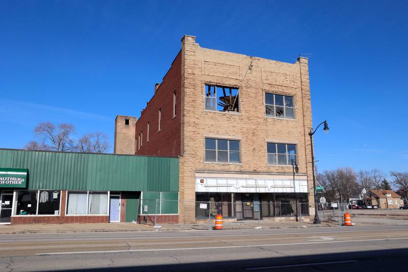 The sky can be seen through the collapsed roof at the 591-599 E. Court St. property in Kankakee. Deemed a significant public safety risk, a temporary chain link fence has been put in place around the perimeter and the city is seeking an owner willing and able to rehab this structure.