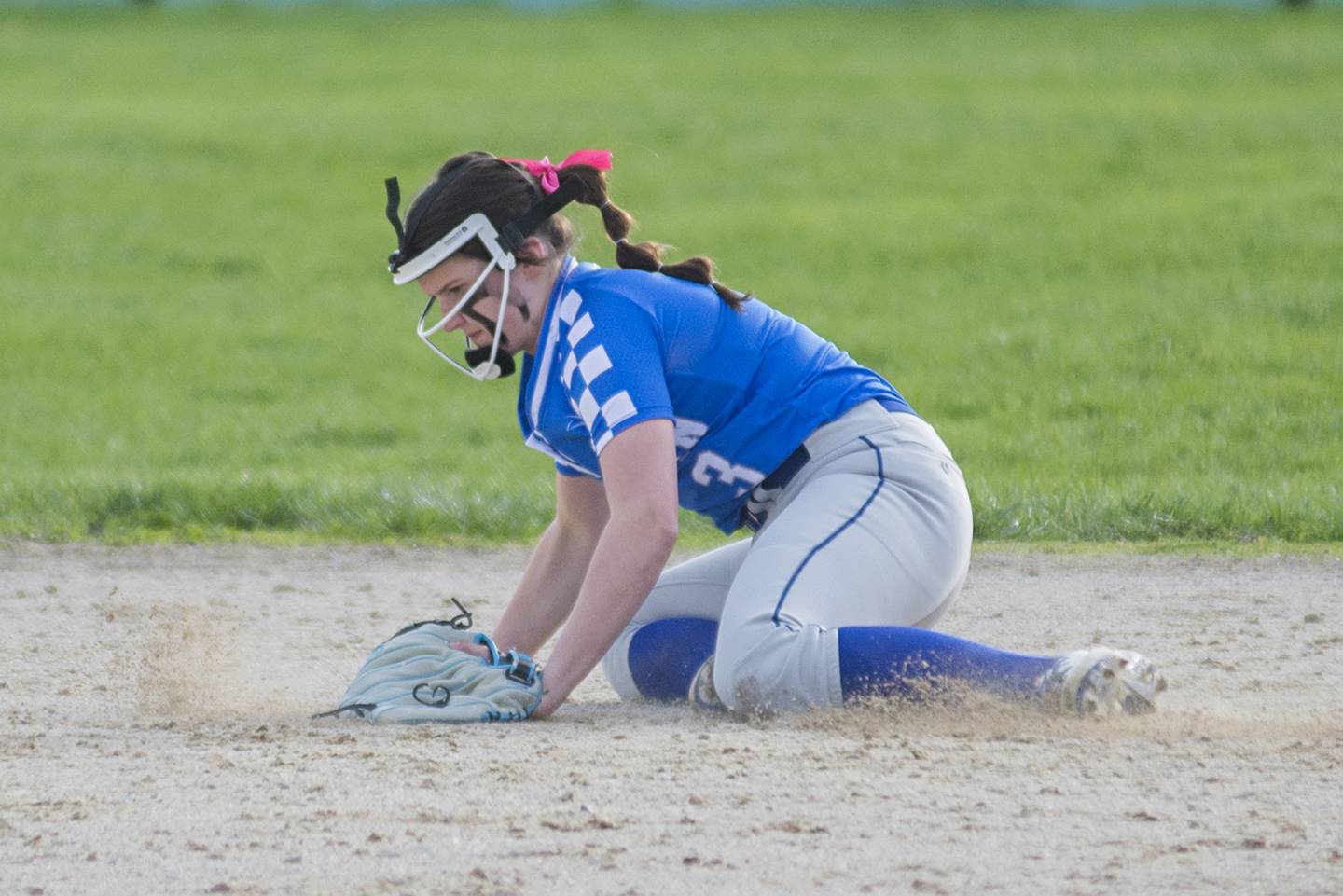 Newman’s Addison Foster smothers a grounder at second against St. Bede Wednesday, May 4, 2022.