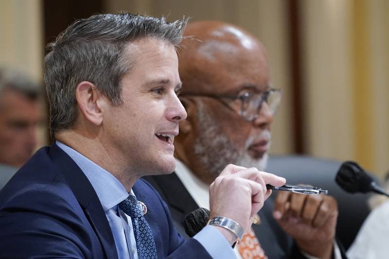 Rep. Adam Kinzinger, R-Ill., left, speaks as the House select committee investigating the Jan. 6 attack on the U.S. Capitol continues to reveal its findings of a year-long investigation, at the Capitol in Washington, Thursday, June 23, 2022. Chairman Bennie Thompson, D-Miss., listens at right. (AP Photo/J. Scott Applewhite)