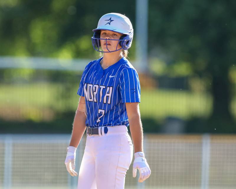 St Charles North's Mackenzie Patterson (7) looks in at the dugout after hitting a double during the Class 4A Glenbard West Regional Final softball game between Glenbard North at St Charles North.  May 26, 2023.