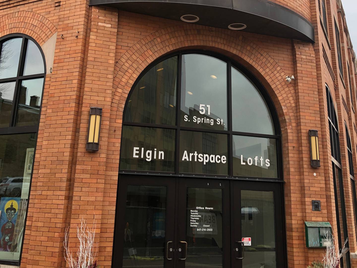 The public entrance for Elgin ArtSpace Lofts, 51 S. Spring St., Elgin, on Wednesday, Feb. 7, 2024. The 55-unit, income-eligible apartment building opened in late 2012 in a former Sears and Roebuck store.
