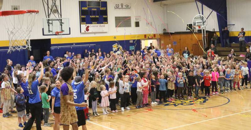 Kids dance to music as confetti pours down during the Harlem Wizards event on Tuesday, Oct. 28, 2025 in Pannebaker Gymnasium at Logan Jr. High School in Princeton.
