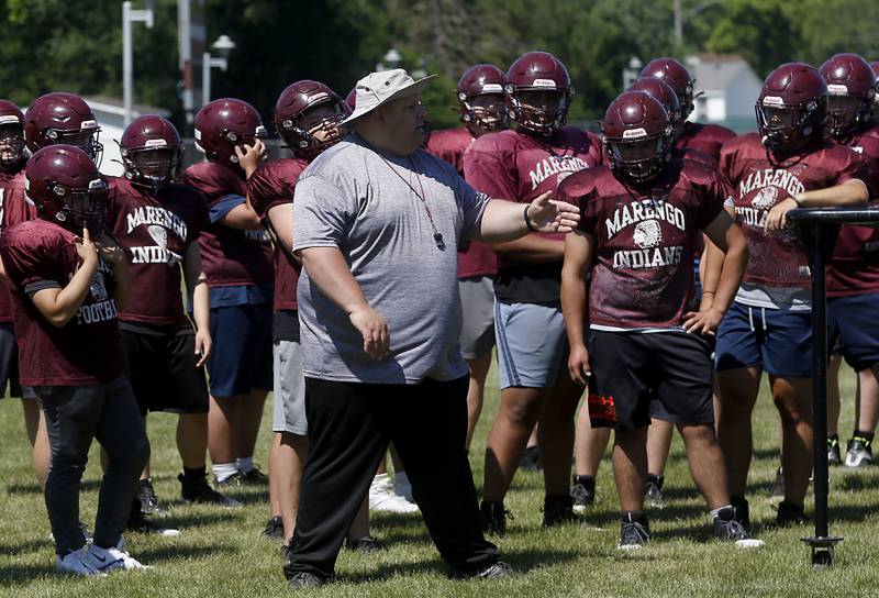 Marengo’s Josh Holst takes a break during summer football practice Monday, June 27, 2022, at Marengo Community High School in Marengo.