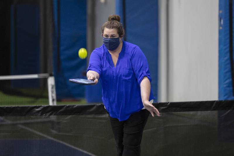 St. Anne’s teacher Amy Seyller serves the ball Wednesday, Sept. 17, 2025, while demonstrating pickleball for her students at Westwood.