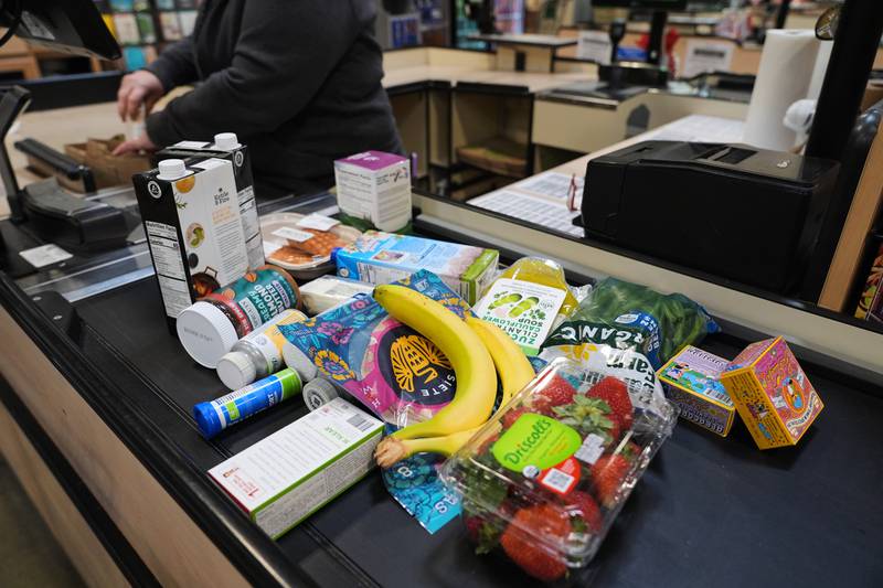 A cashier scans groceries, including produce, which is covered by the USDA Supplemental Nutrition Assistance Program (SNAP), at a grocery store in Baltimore, Monday, Nov. 10, 2025. (AP Photo/Stephanie Scarbrough)