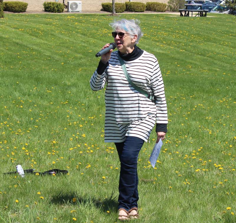 Former McHenry County board member and Army veteran Lou Ness speaks at a rally on April 27, 2025 in McHenry.