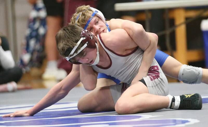 Newman's Landon Near wrestles Richmond-Burton's Lelan Nelson during the 61st annual Lyle King wrestling tournament on Saturday, Jan. 11, 2024 at Princeton High School.