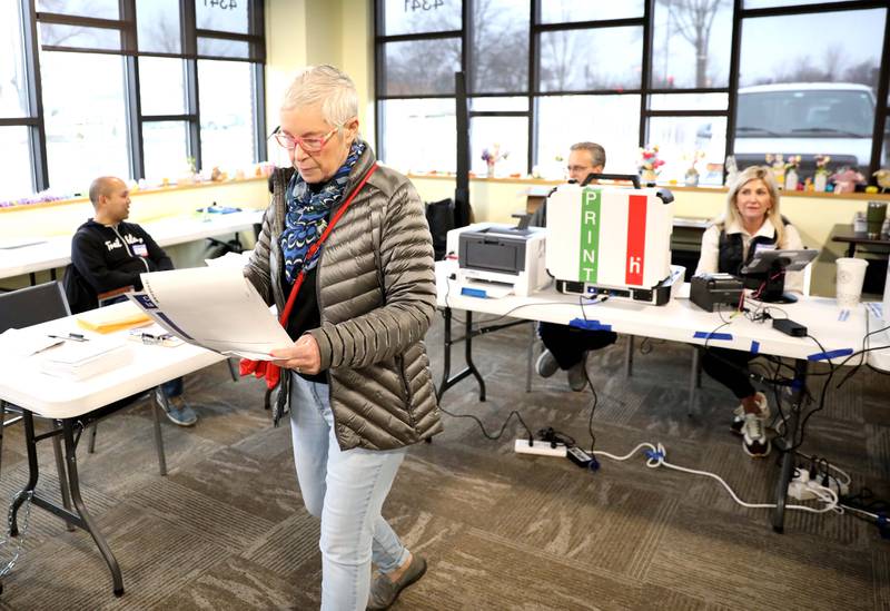 Voter Lisa Rasin of Downers Grove votes in the Consolidated Election at the Downers Grove Township offices polling place on Tuesday, April 3. 2023.
