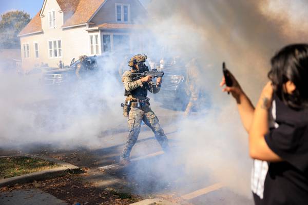 Official defends use of tear gas in Chicago and says agents on immigration sweeps have cameras