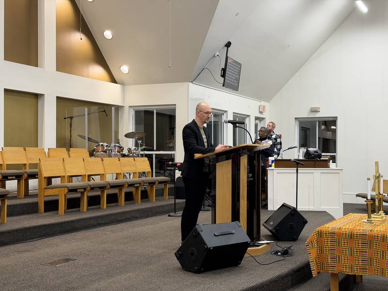 The Rev. Eric Ogi of Sycamore Federated Church speaks to a crowd of about 75 gathered on Martin Luther King Jr. Day on Monday, Jan. 19, 2026, at New Hope Missionary Baptist Church in DeKalb for the annual MLK Day Celebration.