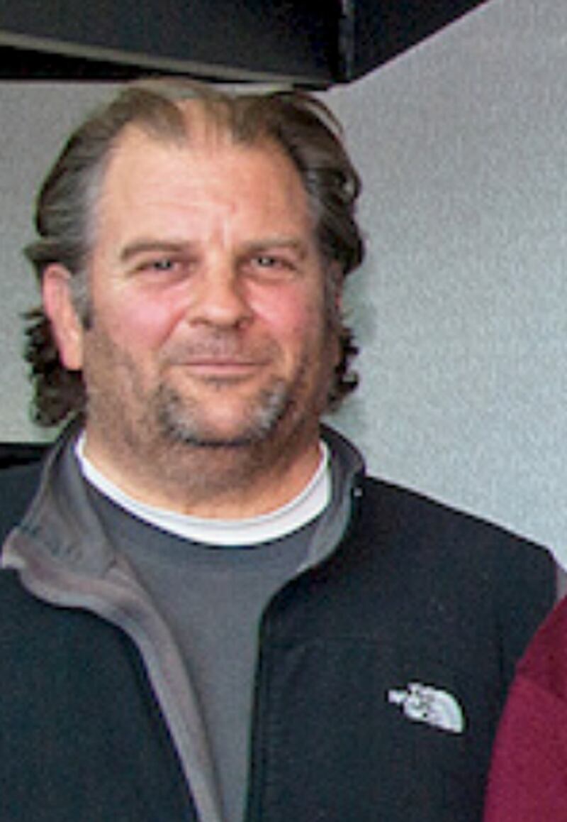Craig Raguin pictured in 2014 after receiving the Master Contractor Award by Firestone Building Products Company LLC.