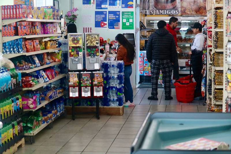 Shoppers search the shelves on Monday, Feb. 10, 2025, at DeKalb Fresh Market, 615 Oak St., DeKalb. Increased tariffs ordered by President Donald Trump's administration could impact local shoppers and businesses.