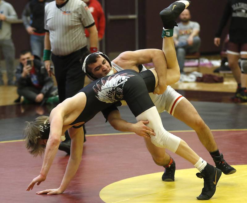 Marian Central’s Max Astacio controls Richmond-Burton’s Brody RudkinMarengo’s Gregory Baker in their 160-pound championship wrestling match in the IHSA 1A Richmond-Burton Wrestling Regional Thursday, Jan. 19, 2023, at Richmond-Burton High School in Richmond.