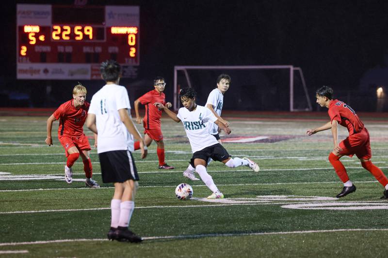 Bishop McNamara's Seanpierre Alvarado looks to pass through Bradley-Bourbonnais defenders during the Boilermakers' 9-0 victory over Bishop McNamara in an All-City match up on Wednesday, Sept. 3, 2025.
