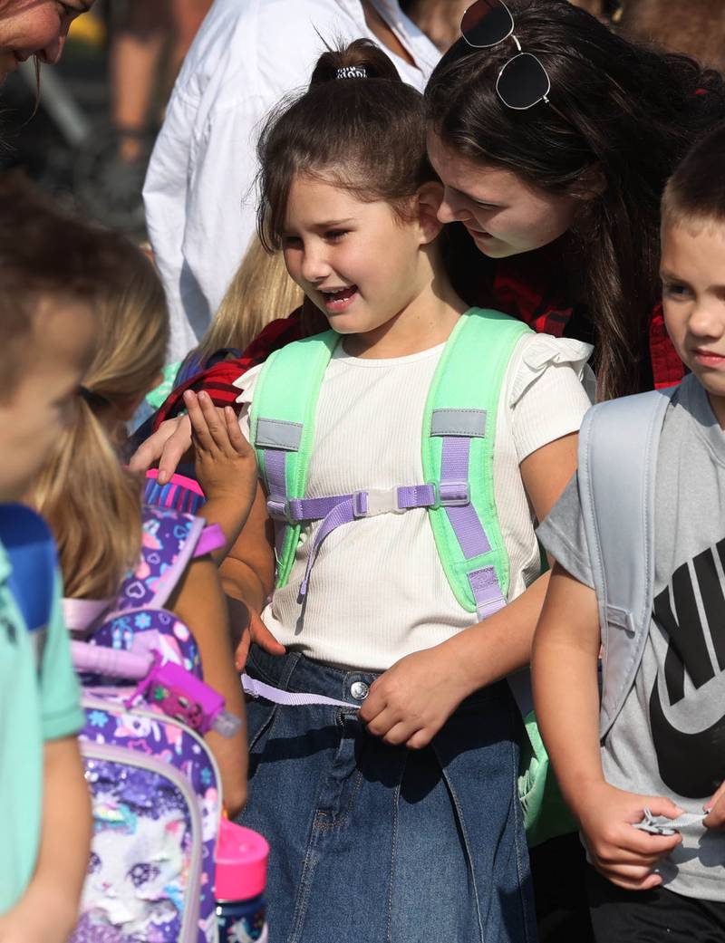Students at Southeast Elementary School greet their friends on first day of classes Thursday, Aug. 21, 2024, at the school in Sycamore.
