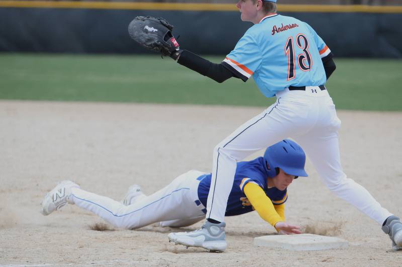 Aurora Christian's Nolan Robertson slides back into first base safely before the throw against Sandwich on Tuesday, April 1, 2025 in Sandwich.