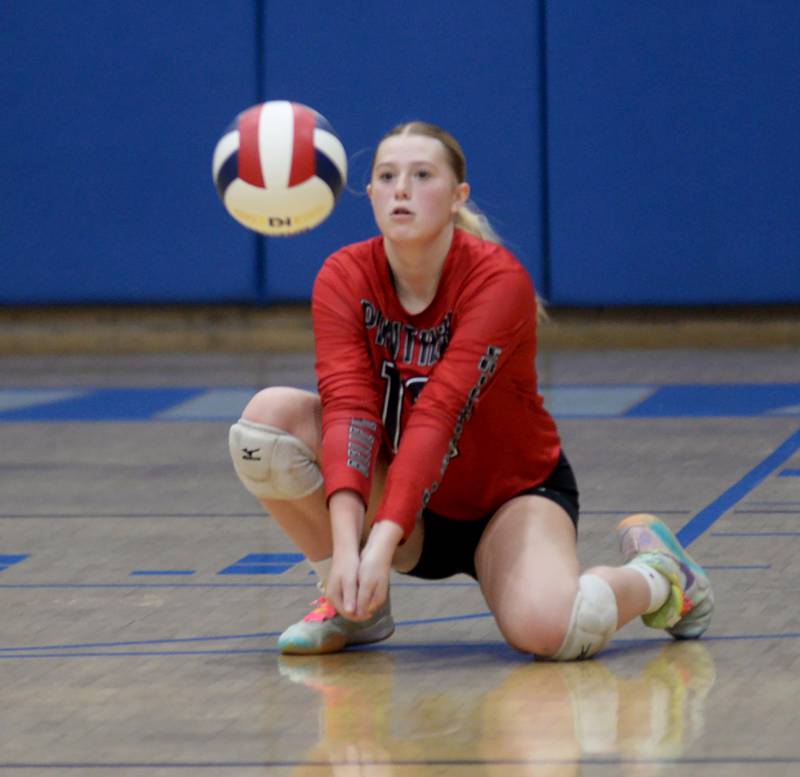 Erie-Prophetstown's Peyton Umstead (12) receives a serve against Rock Falls' during the championship match at the 2A Sterling Newman Regional on Thursday, Oct. 31, 2024.