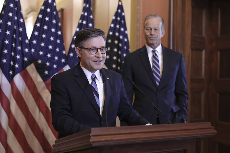 Speaker of the House Mike Johnson, R-La., left, and Senate Majority Leader John Thune, R-S.D., make statements to reporters ahead of vote in the House to pass a bill on President Donald Trump's top domestic priorities of spending reductions and tax breaks, at the Capitol in Washington, Thursday, April 10, 2025. (AP Photo/J. Scott Applewhite)